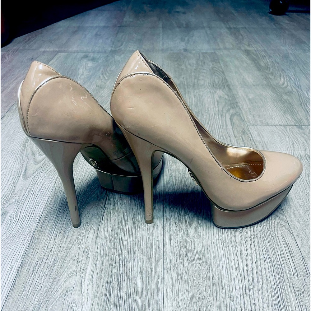 WORN- Jennifer Lopez pumps, beige color with a heel over 4 inches, size 7 1/2.